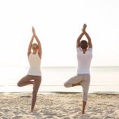 Beach yoga at lake resort in Michigan