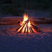 Beach bonfire at lake resort Northern MI
